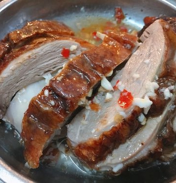烤鸭的烤制过程中如何保持肉质的鲜